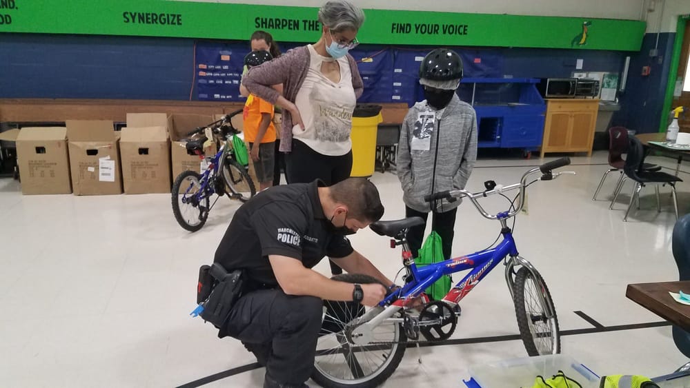 QC Bike Collective’s ‘Earn-A-Bike’ program helps young scholars stay healthy and active for the summer post image