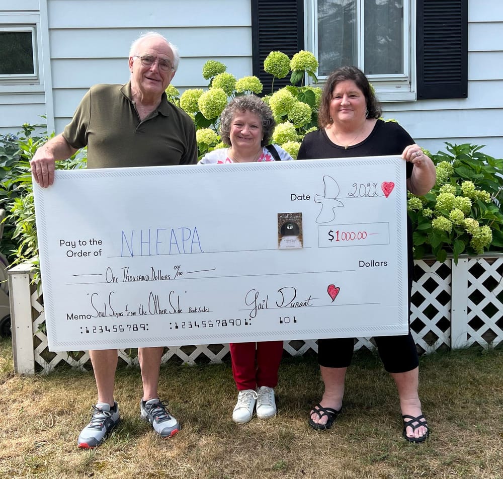 Local author presents check for $1,000 to New Hampshire Foster and Adoptive Parent Association post image