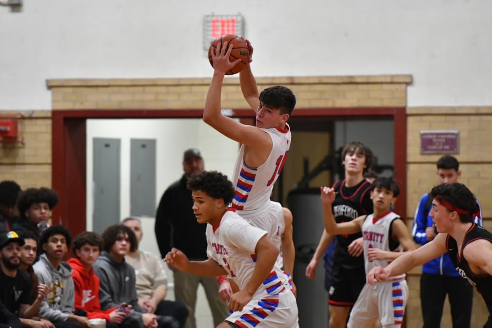 Trinity rallies to claim Queen City title, 64-60, over Bedford post image