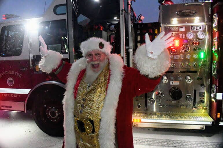 Hundreds catch the holiday spirit at Holt Avenue block party post image