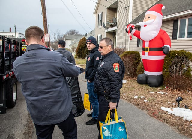 Manchester firefighters continue the tradition of delivering Christmas wishes to local kids post image