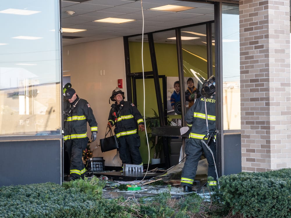Driver crashes through window at South Willow bank, no injuries reported post image