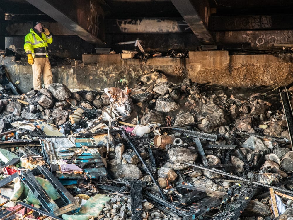 Encampment fire closes highway during morning commute, I-293 bridge inspected for structural issues post image