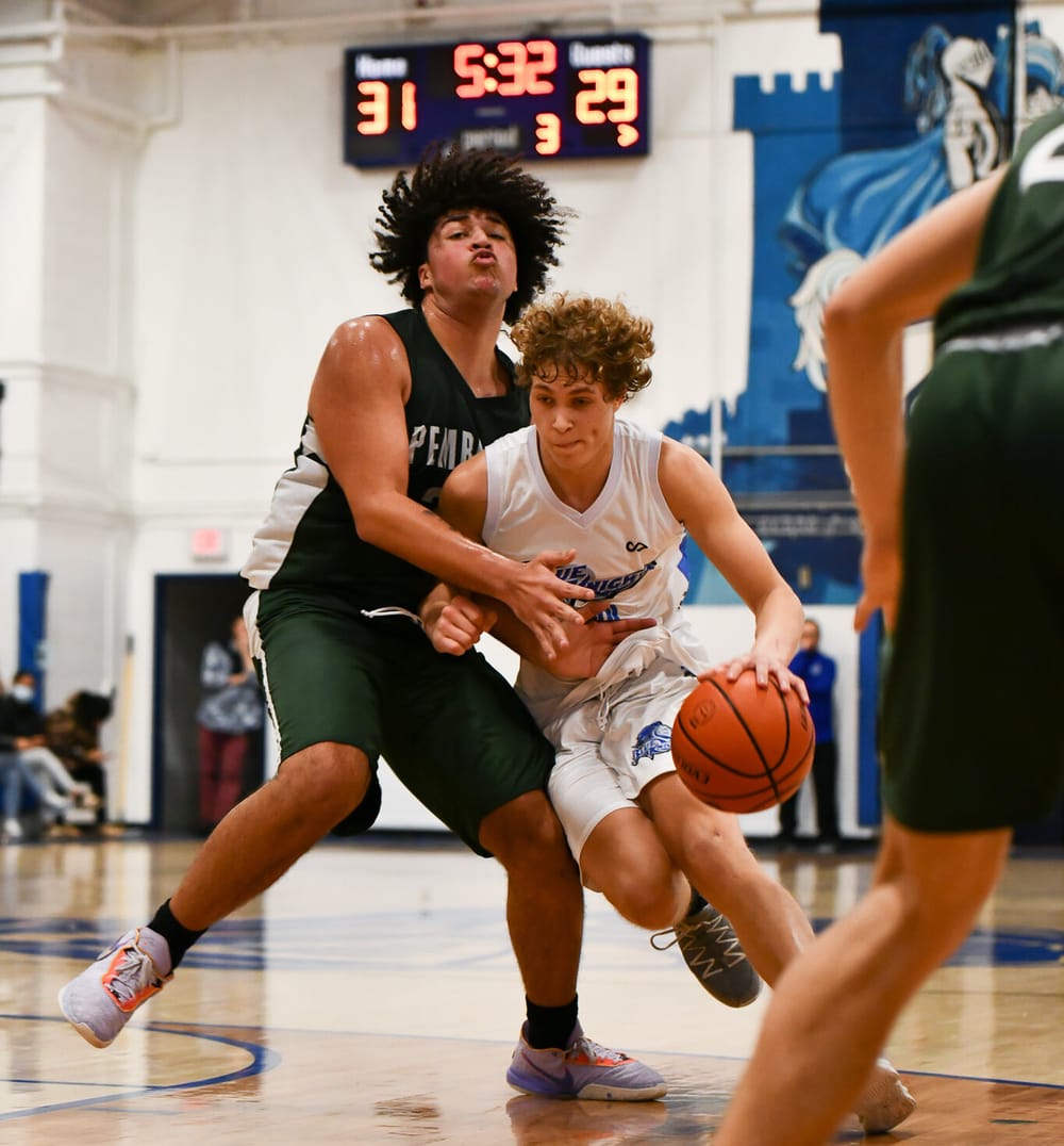 Blue Knights fend off Spartan invasion post image