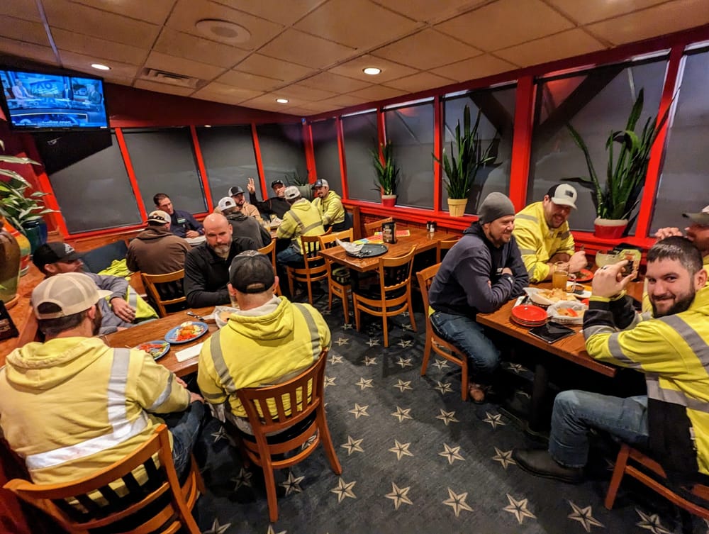 Storm chasers: Line workers from across the country answer the call for NH power outage post image