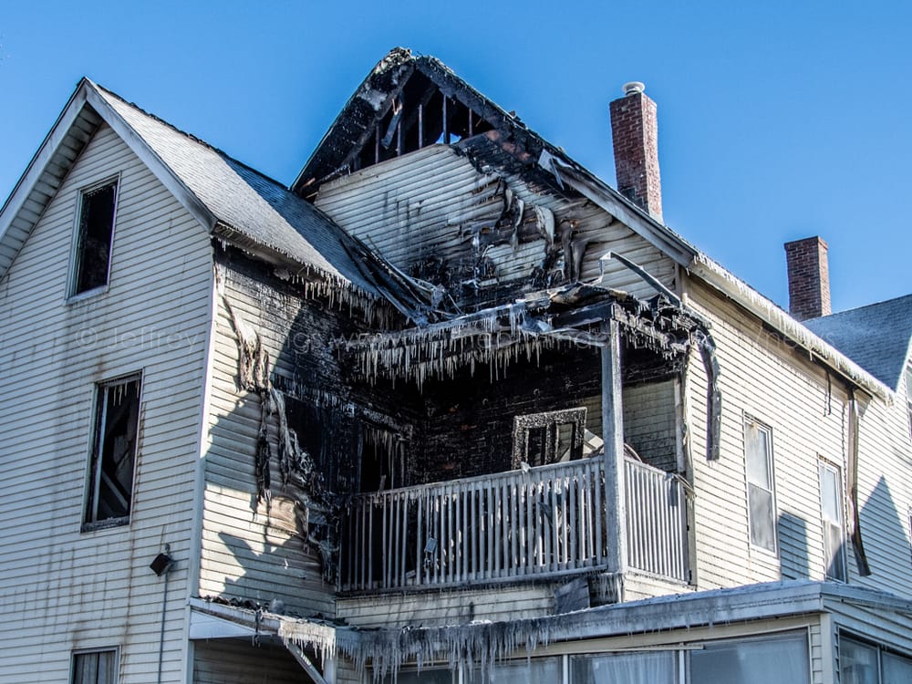 6 people displaced, 2 firefighters injured in late night fire on Liberty Street attributed to careless smoking post image