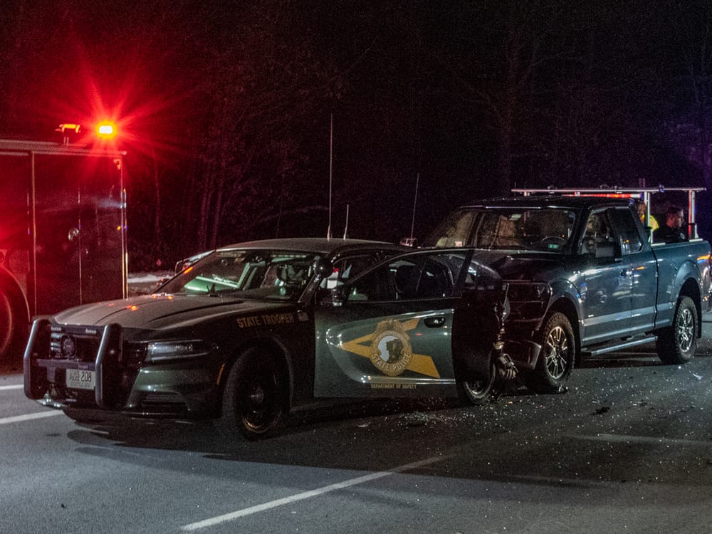2 injured, including State Trooper, after cruiser struck from behind while assisting stranded motorist post image