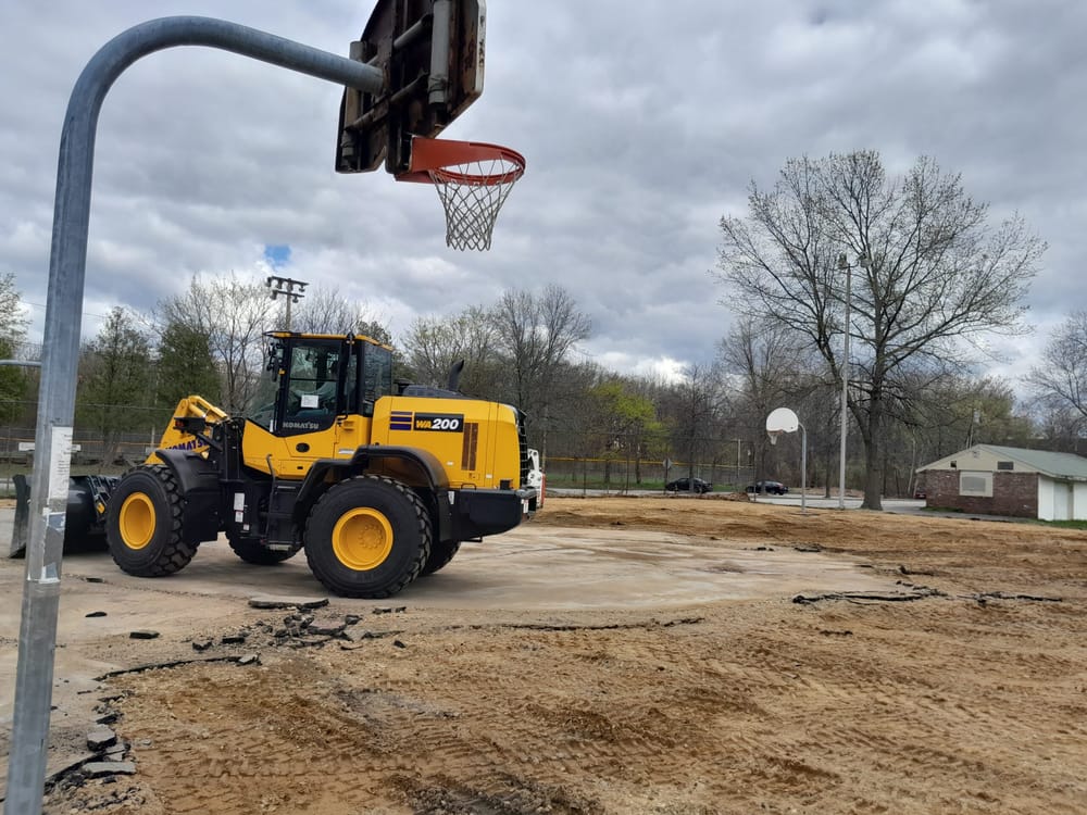Hoopla over hoops: Wolfe Park is the latest city basketball court to get a makeover post image