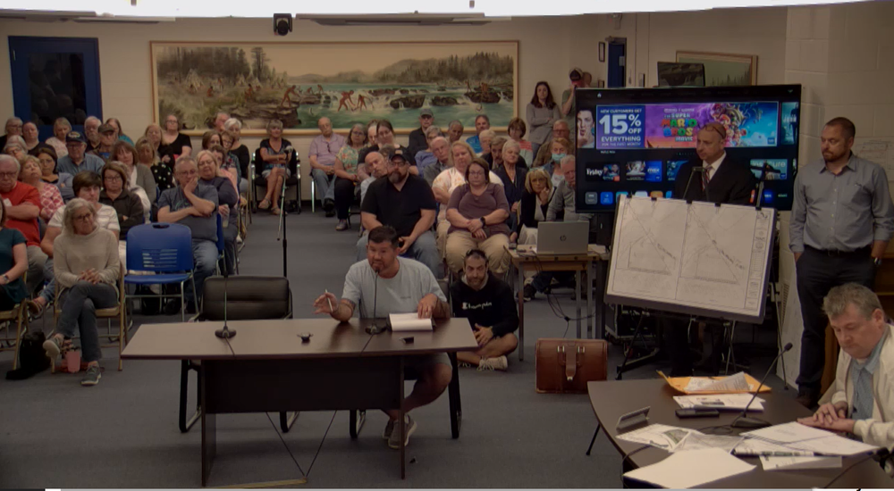 Hooksett neighbors voice concerns over proposed bus storage area post image