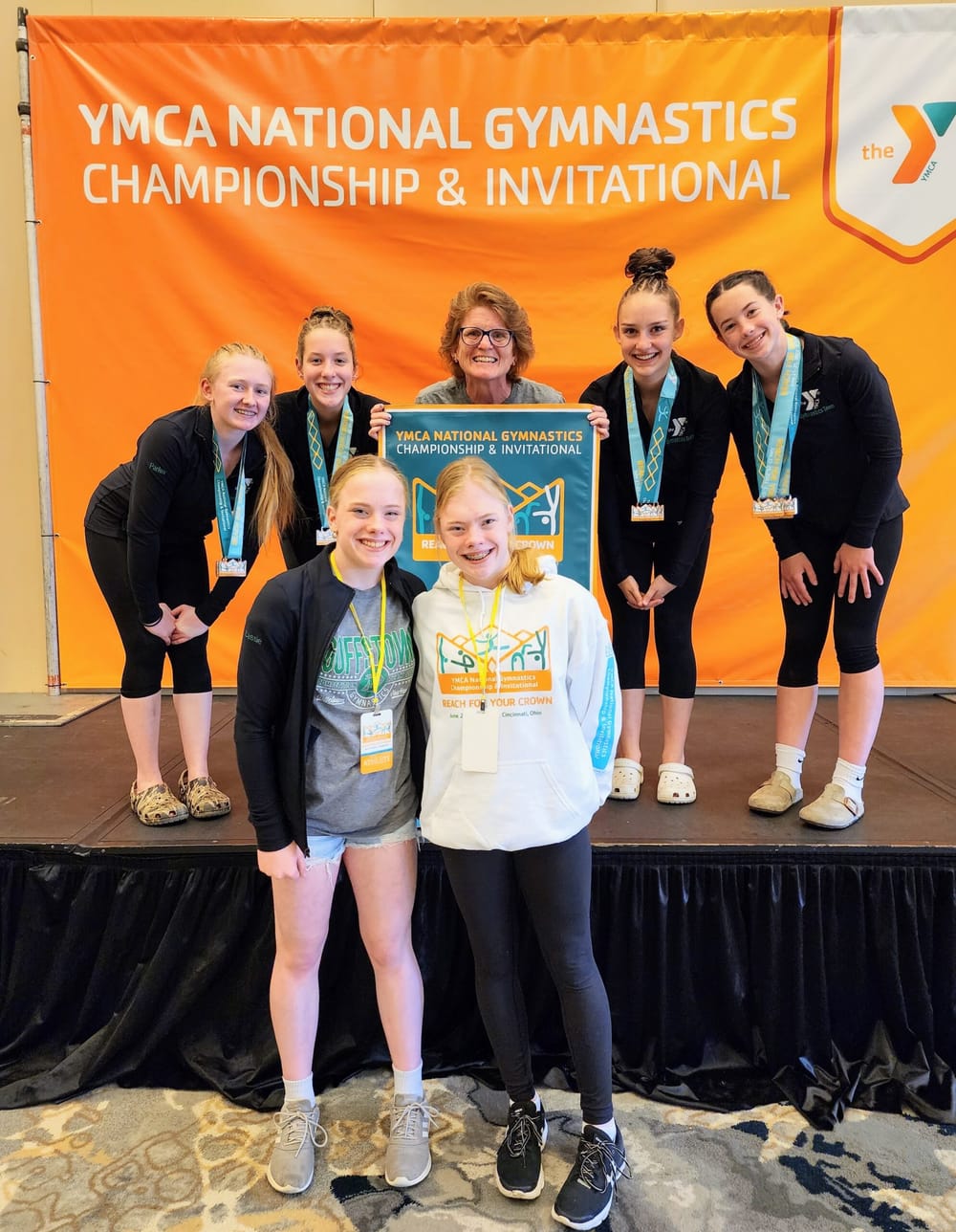 6 YMCA gymnasts medal at national competition post image