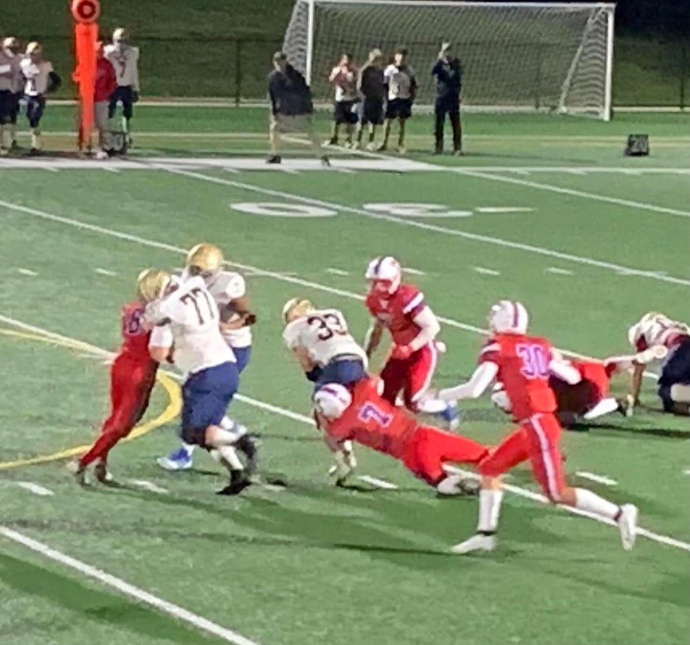Trinity football remains unbeaten, makes short work of ConVal, 49-0 post image