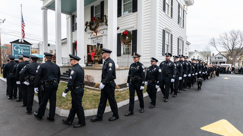 Hundreds pay respects to retired Goffstown police chief Michael French post image
