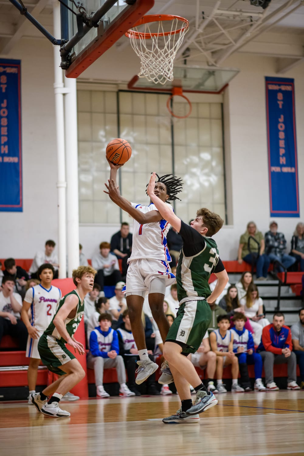 Trinity cuts through Green Wave, surfs into quarterfinals post image