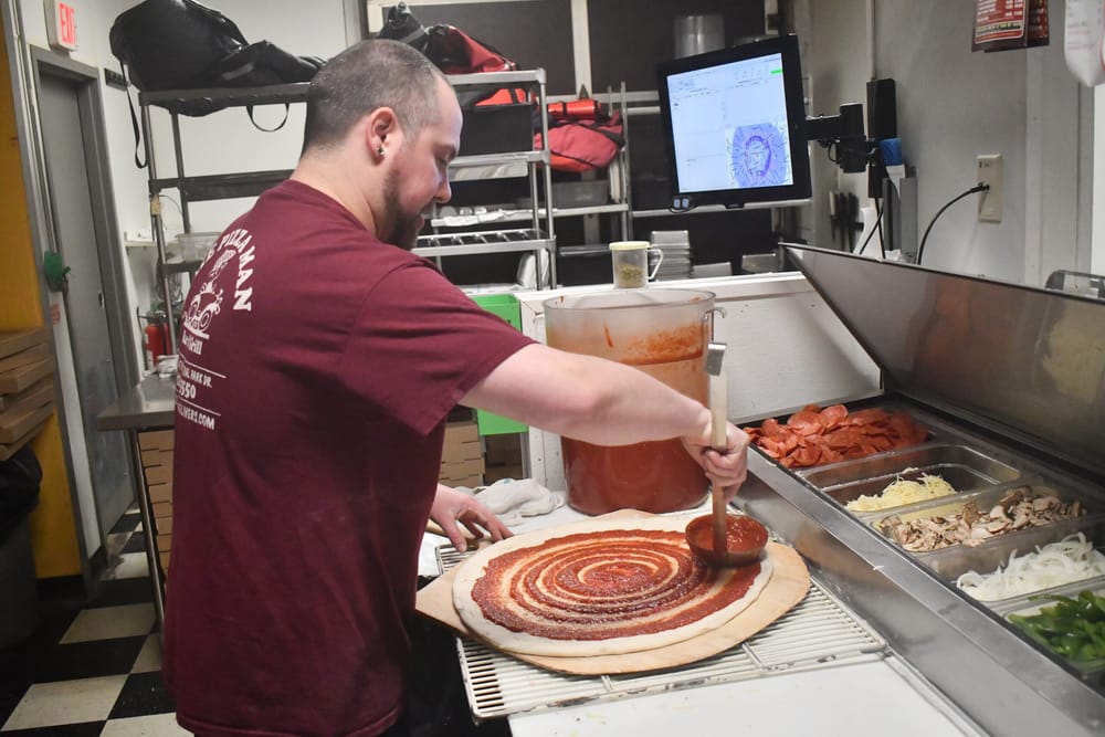Pizza Man is your 2025 Pizza Madness Champion post image