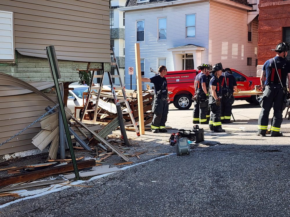 Car crashes into building on Cedar Street causing heavy damage and gas leak, then flees post image