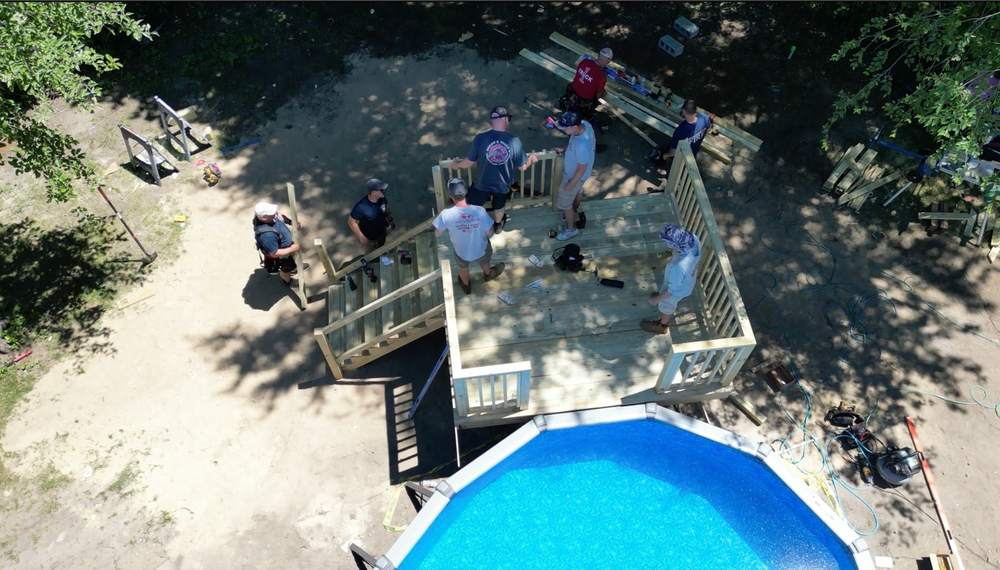 Wish granted: Manchester firefighters come together for Make-A-Wish swimming pool installation post image