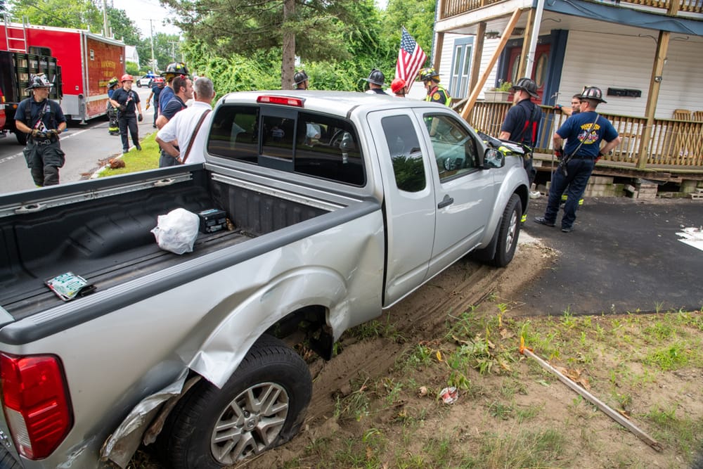 No injuries in crash that sent truck into Candia Road multi-family home post image