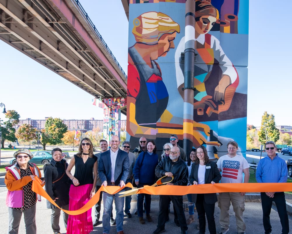 Millworkers, part 2: Ribbon cut on companion mural honoring female textile workers post image